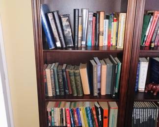 3 bookcases and books  bookcases all match