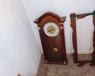 Clock and gun rack