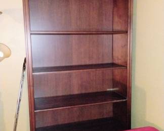 large book case matches small ones