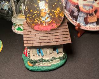 The Wizard of Oz house that fell and the witch the figurine