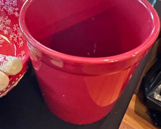 red ceramic kitchen utensil holder