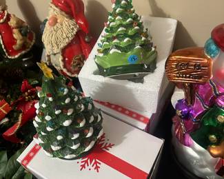 Small lighted Christmas trees