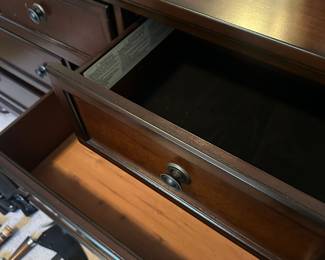 Dresser with plenty of storage and a matching mirror