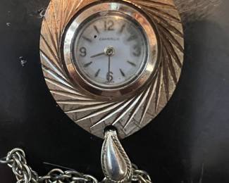 vintage Caravelle gold-tone oval pendant watch