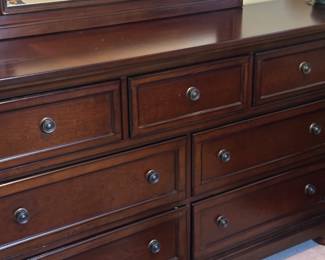 Dresser with plenty of storage and a matching mirror