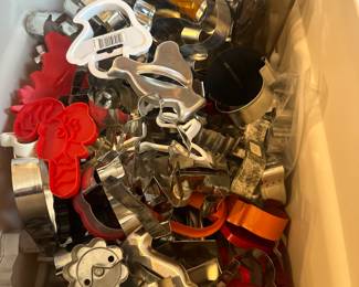 various metal and plastic cookie cutters