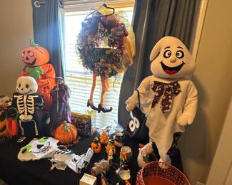 Halloween decor including ghosts, skeletons, pumpkins, and more