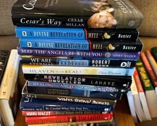 Various books including one by Cesar Millan