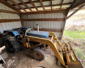 Long 460 Tractor with Bushhog 300 Loader