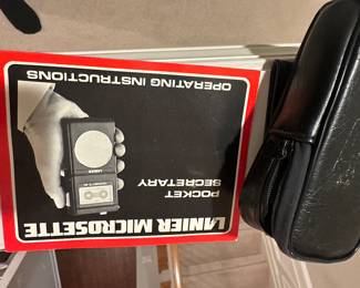 Lanier Microsette Pocket Secretary handheld microcassette recorder and its carrying case