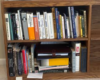wooden bookshelf filled with books