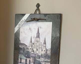 piece of art featuring a print of the St. Louis Cathedral in New Orleans