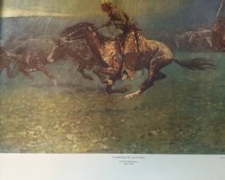 print of the painting The Stampede by American artist Frederic Remington