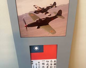 Display featuring a picture of two Bell P-39 Airacobra fighter aircraft and the flag of the Republic of China 