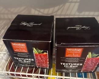 Hi-Ball glassware in boxes