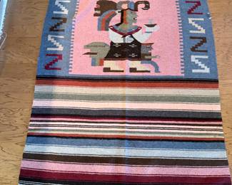 Handwoven Southwestern pictorial rug
	•	Human / Yei-style figure motif
	•	Textured weave 