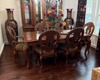 Formal Dining room table with 2 leaves and 6 chairs and matching china cabinet