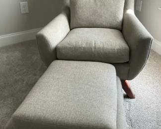 Modern Gray Upholstered Armchair with Matching Ottoman