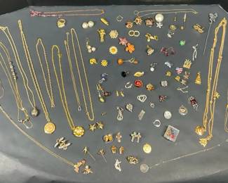 Large Vintage Costume Jewelry Assortment with Necklaces, Pins, Earrings  Charms