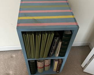 H57 - $20. Painted Shelves / Bookcase. Measures 12.75" x 11.5" deep x 26.5" tall.