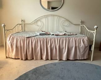 H62 - $225. Twin Day Bed with Trundle. Off white with brass accents. Measures 82.5" long x 41" deep x 43" tall. Includes both mattresses if you'd like them as well as custom sewn bedskirt & curtains. 