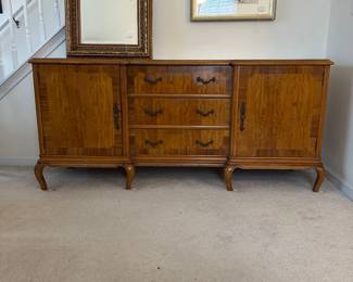 H2 - $150. Buffet Storage Cabinet. Measures 71" wide x 20" deep  32.5" tall. All drawers slide. Was used for linen storage - very versatile piece! Top has some minor water marks etc but overall good condition!