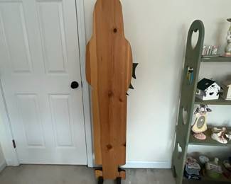 H91 - $35. Folk Art Santa. Measures 16" x 10" x 64" tall. 