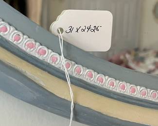 H63 - $30. Painted Framed Mirror. Measures 31" x 24.25"