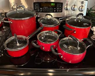 H19 - $25 for the Set of Red Culinary Comforts non stick pots. There are some scratches in the bottoms of some. 