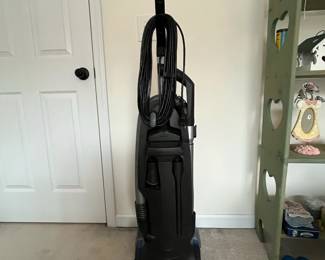 H89 - $100. Miele Power Plus Upright Vacuum. Works but needs cleaned up. 