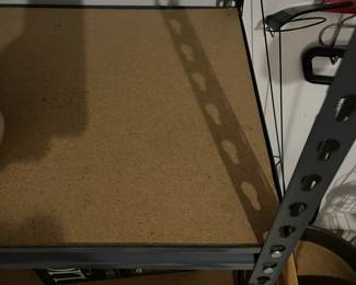 H87 - $45. Adjustable Garage Shelf w/ 3 Shelves (currently not a shelf on the top) Measures 36" wide x 18" deep x 60" tall. 