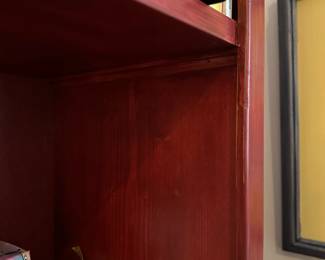 H41 - $100. Red Bookcase - shelves are NOT adjustable. Measures 52" at the widest trim. Main frame is 47" x 11.5" deep x 77" tall. Very good condition!