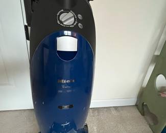 H89 - $100. Miele Power Plus Upright Vacuum. Works but needs cleaned up. 