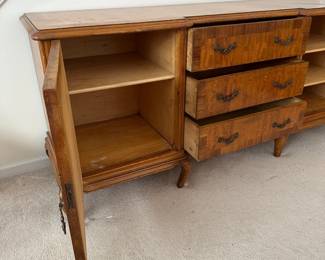 H2 - $150. Buffet Storage Cabinet. Measures 71" wide x 20" deep  32.5" tall. All drawers slide. Was used for linen storage - very versatile piece! Top has some minor water marks etc but overall good condition!