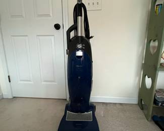H89 - $100. Miele Power Plus Upright Vacuum. Works but needs cleaned up. 