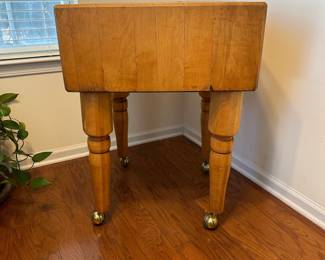 H4 - $600. Vintage Butcher Block on Wheels. Measures 24" square x 33.5" tall. There was a plant on top of it that damaged a spot on the top - see photos. 