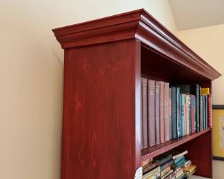 H41 - $100. Red Bookcase - shelves are NOT adjustable. Measures 52" at the widest trim. Main frame is 47" x 11.5" deep x 77" tall. Very good condition!