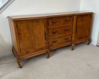 H2 - $150. Buffet Storage Cabinet. Measures 71" wide x 20" deep  32.5" tall. All drawers slide. Was used for linen storage - very versatile piece! Top has some minor water marks etc but overall good condition!