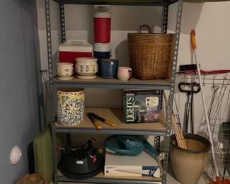 H87 - $45. Adjustable Garage Shelf w/ 3 Shelves (currently not a shelf on the top) Measures 36" wide x 18" deep x 60" tall. 