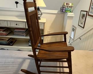 H67 - $60. Wooden Rocking Chair - bigger size. Measures 26.75" x 34" x 46" tall. 