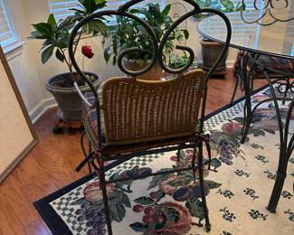 H3 - $175. Glass Top Table is 4' across x 30" tall. Includes 4 Iron framed chairs with cushioned seats. Glass has some minor scratches from use but nothing sharp and no big chips. 