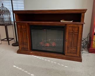 H1 - $150. Classic Flame Electric Fireplace. Model 28EF024GRS. Measures 55" x 18" deep x 37.5" tall. Doubles as Entertainment Stand / TV Stand. Works and has remote!
