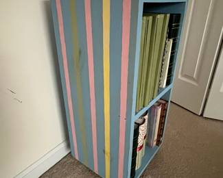 H57 - $20. Painted Shelves / Bookcase. Measures 12.75" x 11.5" deep x 26.5" tall.