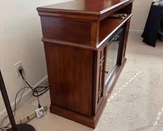 H1 - $150. Classic Flame Electric Fireplace. Model 28EF024GRS. Measures 55" x 18" deep x 37.5" tall. Doubles as Entertainment Stand / TV Stand. Works and has remote!