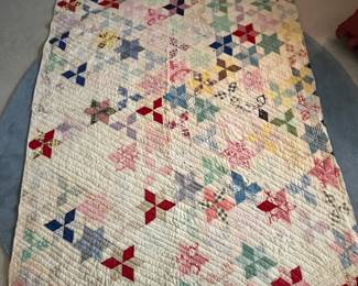 H71 - $35. Antique *Cutter* Quilt - approximately twin size.  See photos of holes!