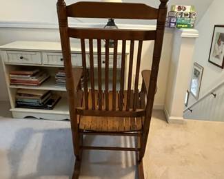 H67 - $60. Wooden Rocking Chair - bigger size. Measures 26.75" x 34" x 46" tall. 