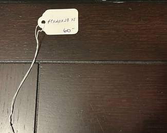 H75 - $60. Sofa Table. Wooden top with metal base. Measures 48" x 20" x 28.75" tall. 