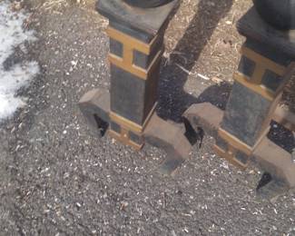 Massive cast iron andirons