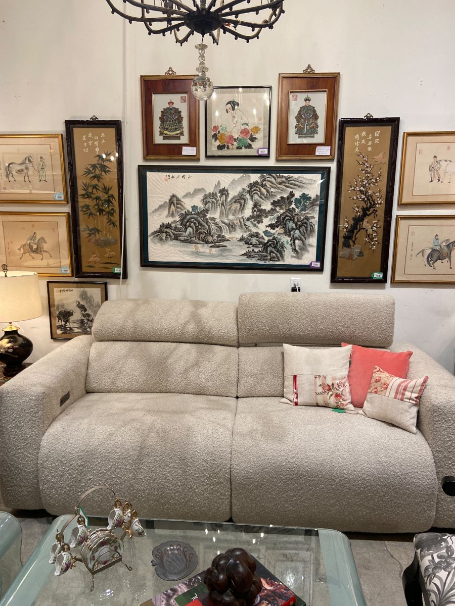 Bernhardt reclining sofa, asian style artwork, glass coffee table