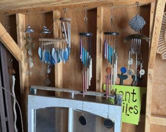 Lot of outdoor decor, windchimes, wood chipper, tools, potting items, etc